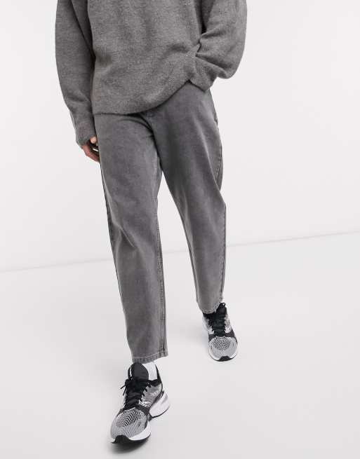 ASOS DESIGN - Sortvaskede tapered jeans i afslappet pasform 