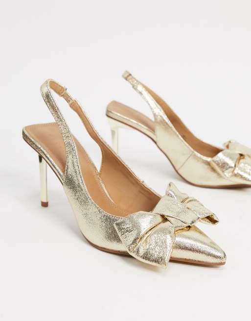 Gold heels 2024 with bow