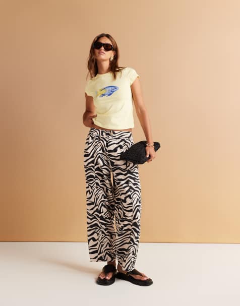ASOS DESIGN laundered barrel leg trousers in zebra print