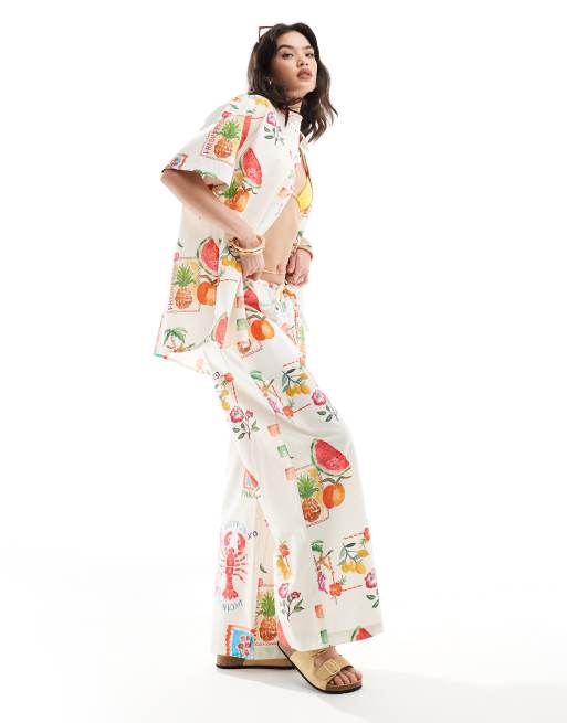 ASOS DESIGN – Spodnie z szerokimi nogawkami z domieszką lnu we wzór w pocztówki, część zestawu