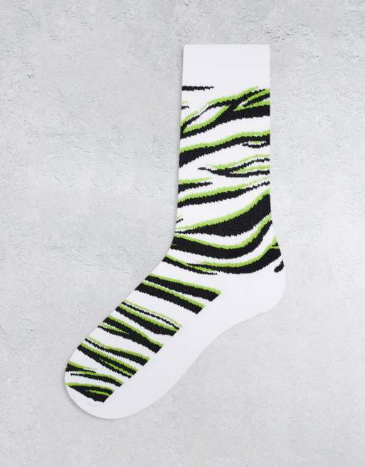 ASOS DESIGN sports sock in white, black and green zebra print