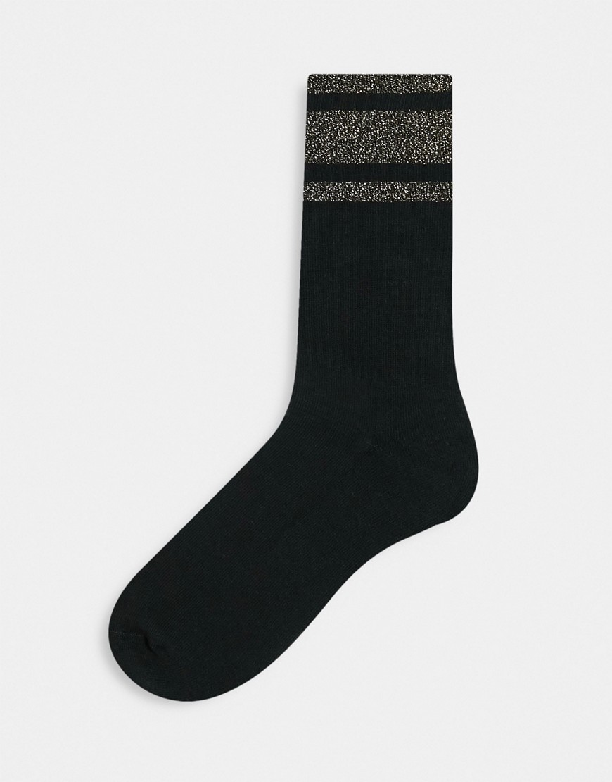 ASOS DESIGN sports socks in black with gold stripe
