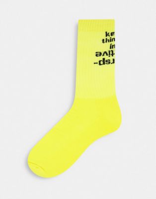 ASOS DESIGN sports socks with slogan design
