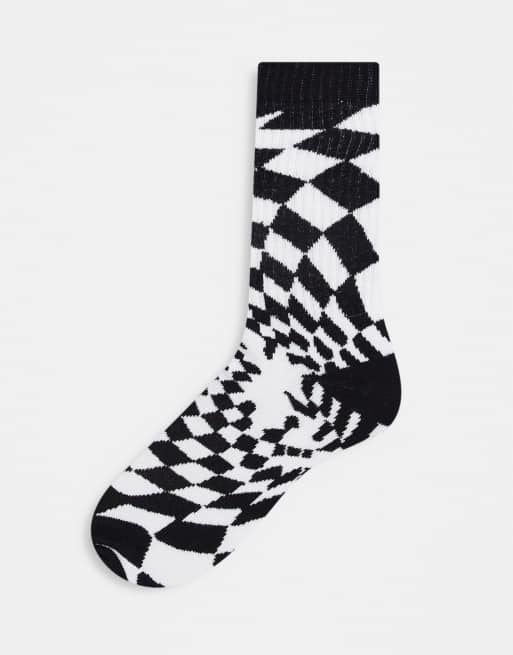 ASOS DESIGN sports socks with swirl check print in black and white