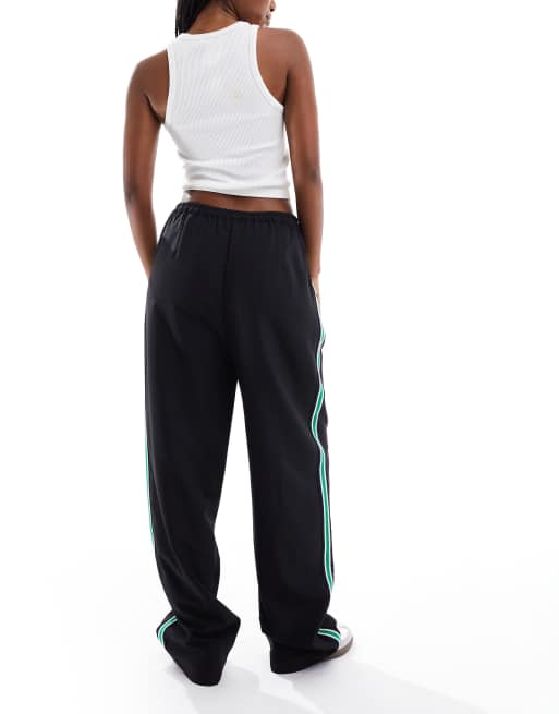 ASOS DESIGN sporty tape panel pull on pants in black