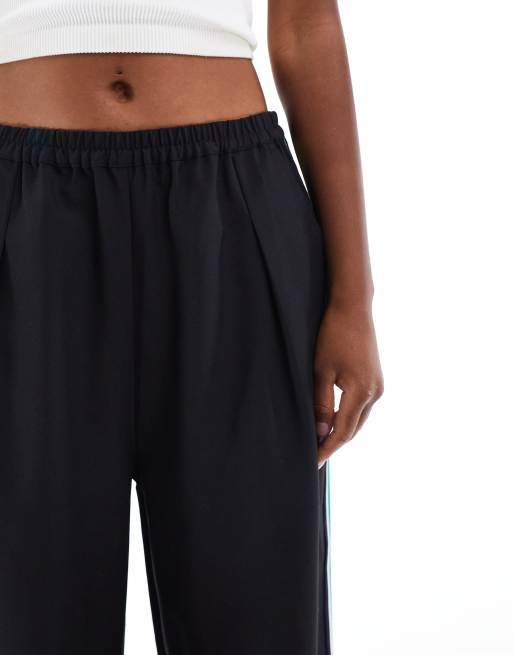 ASOS DESIGN sporty tape panel pull on pants in black