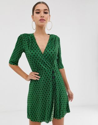 green and black spot dress