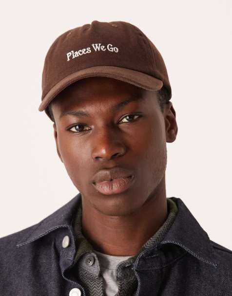 ASOS DESIGN – Sprana brązowa czapka baseballowa z daszkiem z grafiką z logo - view 1