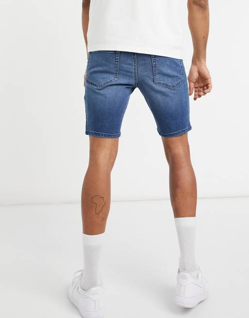 ASOS DESIGN spray on denim shorts with power stretch in dark wash blue, 2 of 4