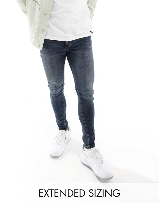 ASOS DESIGN – Spray-on-Jeans aus Powerstretch in verwaschenem Dunkelblau