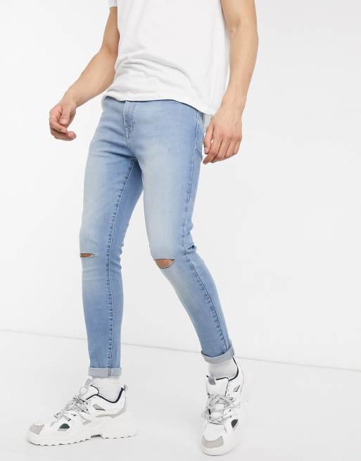 ASOS DESIGN spray on jeans in power stretch denim in light wash