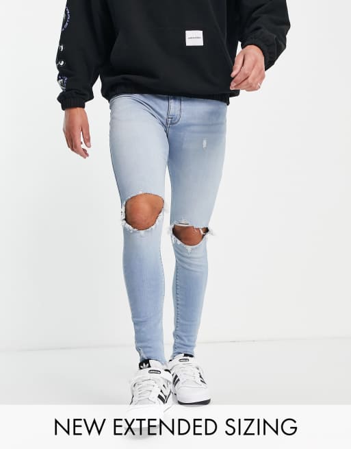 ASOS DESIGN spray on jeans in power stretch denim in light wash