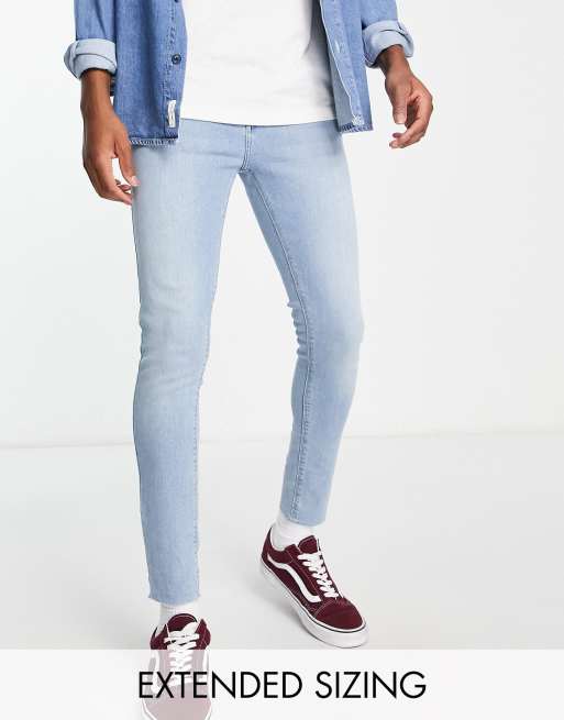 ASOS DESIGN spray on jeans in power stretch denim in light wash