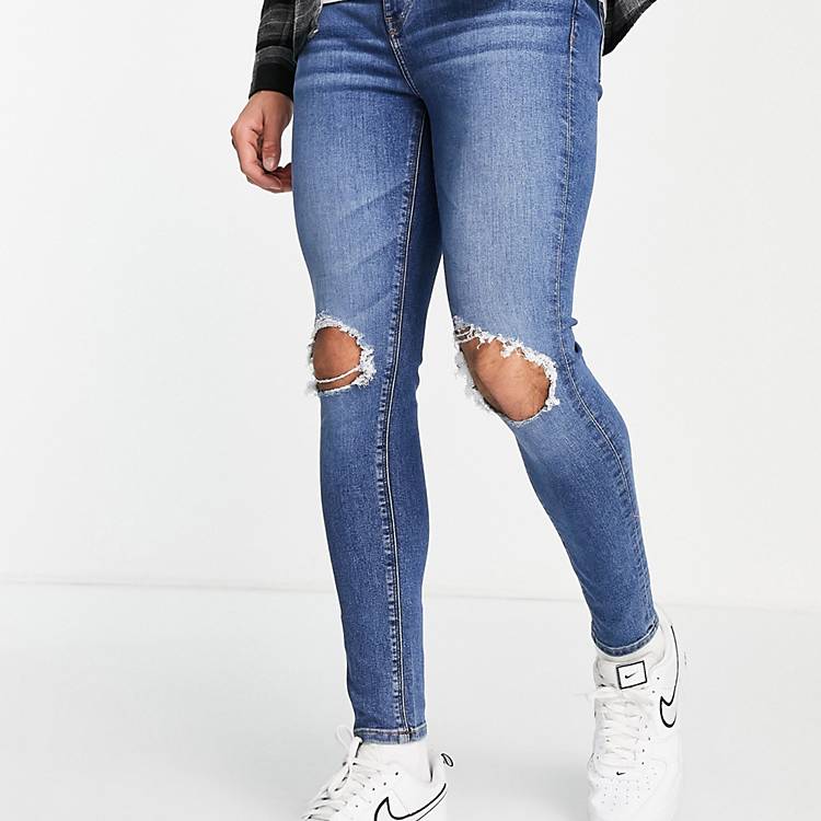 Spray on jeans in power stretch in mid wash with heavy knee rips ASOS Herren Kleidung Hosen & Jeans Jeans Stretch Jeans 