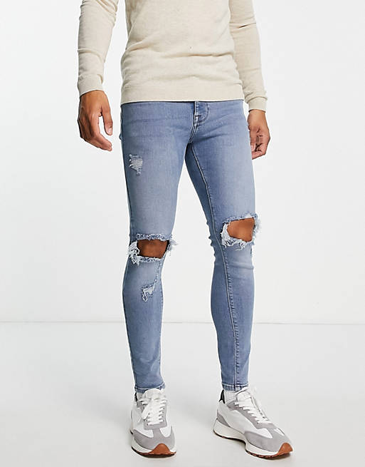 ASOS Herren Kleidung Hosen & Jeans Jeans Stretch Jeans Spray on jeans with power stretch in mid wash with knee rips 