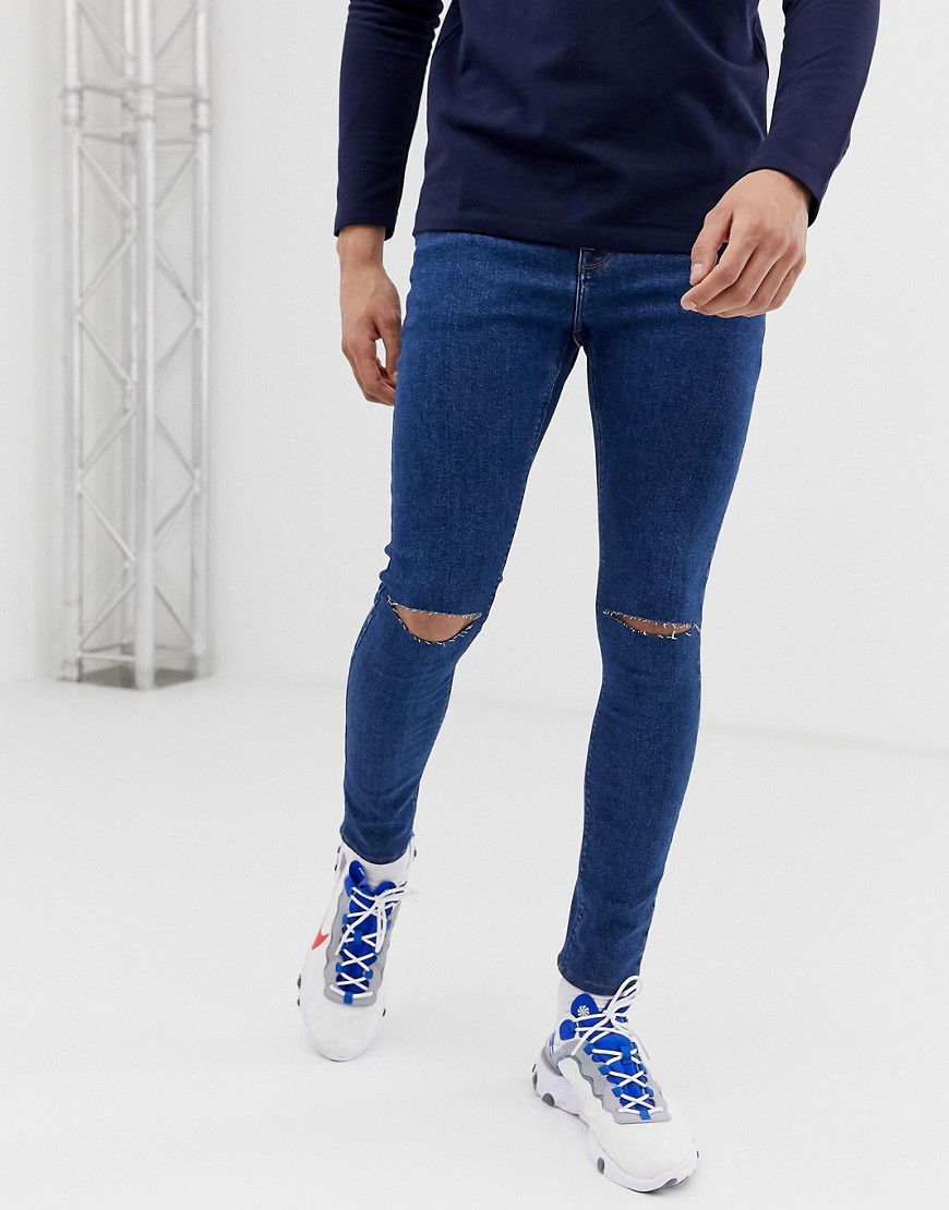 ASOS DESIGN spray on jeans in power stretch open end blue with knee rips