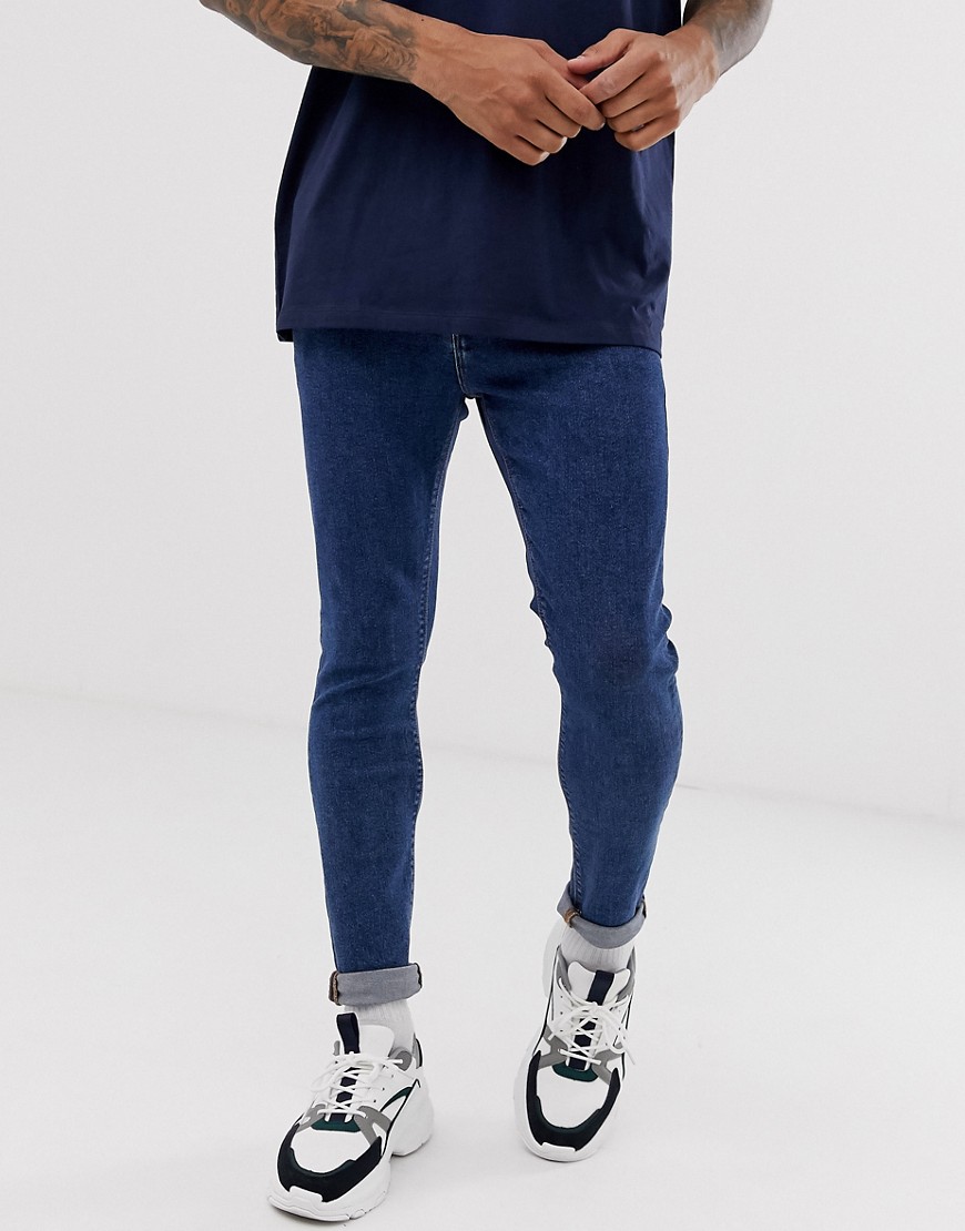 ASOS DESIGN spray on jeans in power stretch open end blue