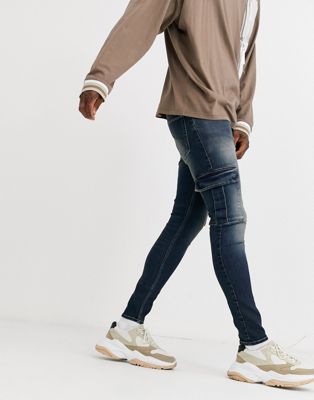 ASOS DESIGN spray on jeans in power stretch with cargo pockets in ...