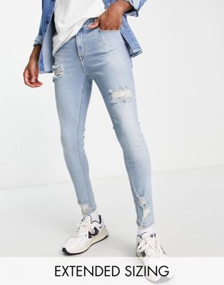 ASOS DESIGN spray on jeans in power stretch with vintage mid wash and abrasions  - ASOS Price Checker