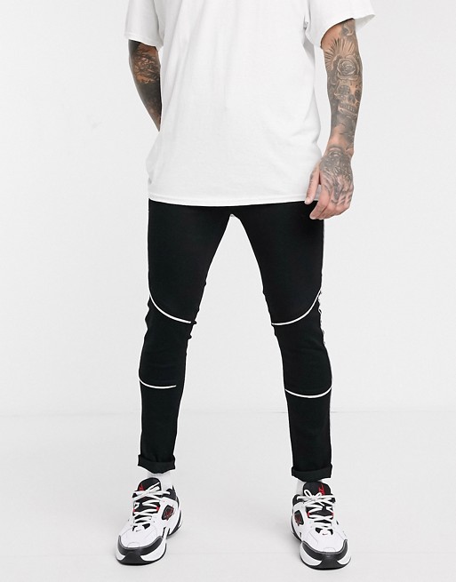 ASOS DESIGN spray on jeans in power stretch with white piping details