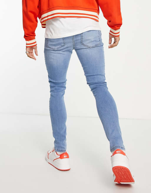 ASOS DESIGN - Spray on-jeans med power stretch og store flænger på knæene i lys vask, 2 af 4