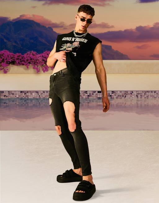 ASOS DESIGN - Spray-on jeans met powerstretch en extreme scheuren in zwart met wassing
