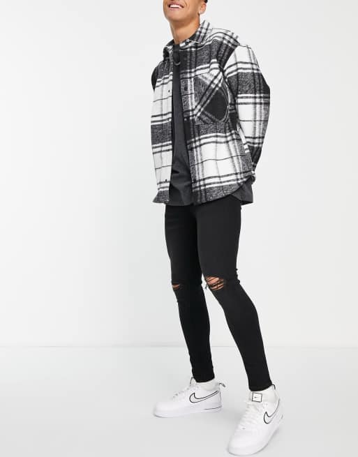 ASOS DESIGN - Spray-on jeans met powerstretch en kapotte knie in zwart , 4 van 4