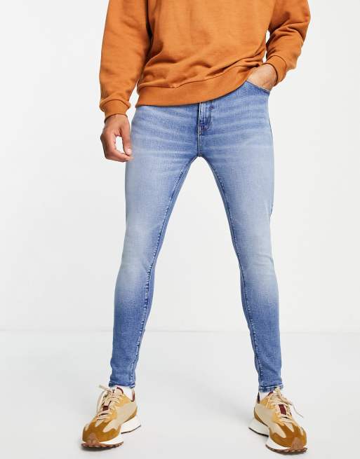 ASOS DESIGN - Spray-on jeans met powerstretch in blauwe medium wassing