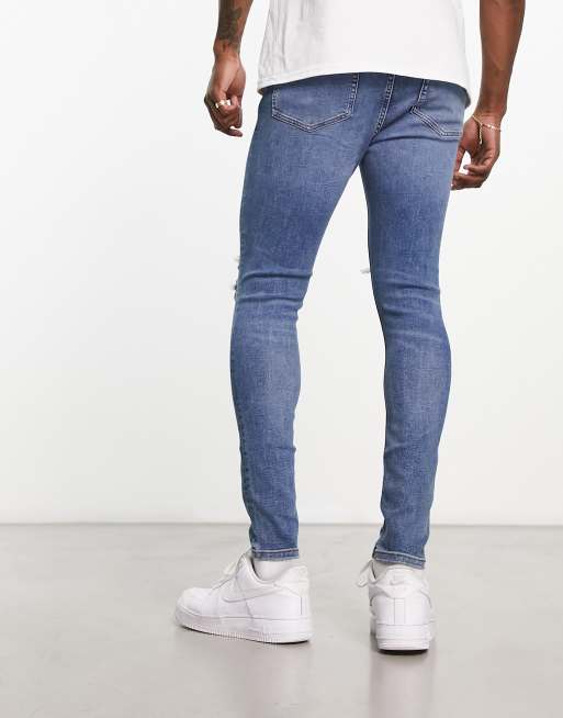 ASOS DESIGN – Spray-on-Jeans mit Power-Stretch in verwaschenem Mittelblau, 3 von 4