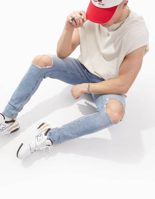 ASOS DESIGN – Spray-on-Jeans mit Powerstretch und Knierissen, Acid-Waschung in Blau, 2 von 4