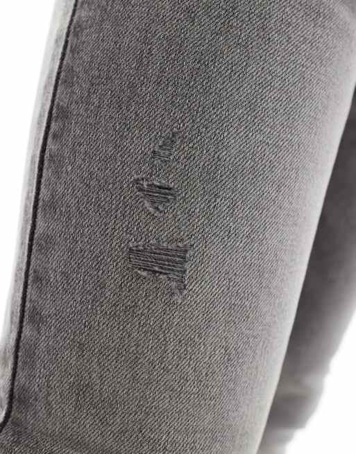ASOS DESIGN spray on jeans with power-stretch denim with rips and panels in washed black, 3 of 5