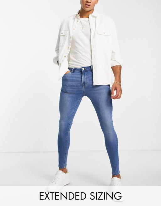 ASOS DESIGN spray on jeans in power stretch denim in light wash