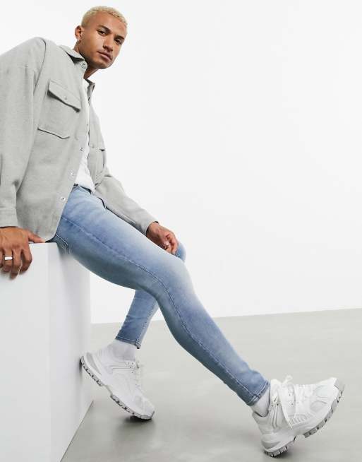 asos design baggy jeans in vintage light wash blue