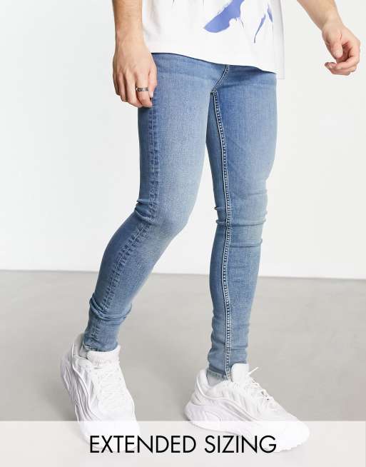 ASOS DESIGN spray-on jeans with power stretch in light wash blue