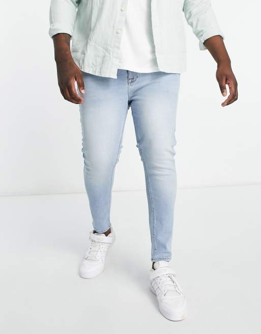 ASOS DESIGN spray on jeans in power stretch denim in light wash