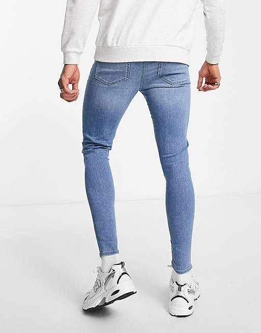 Spray on jeans in power stretch in light wash with knee rips and raw hem ASOS Herren Kleidung Hosen & Jeans Jeans Stretch Jeans 