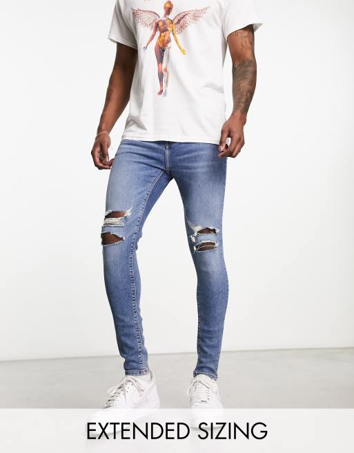 ASOS DESIGN spray on jeans in power stretch denim in light wash