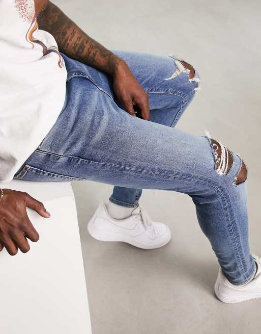 ASOS DESIGN spray on jeans with power stretch in mid wash blue, 4 of 4