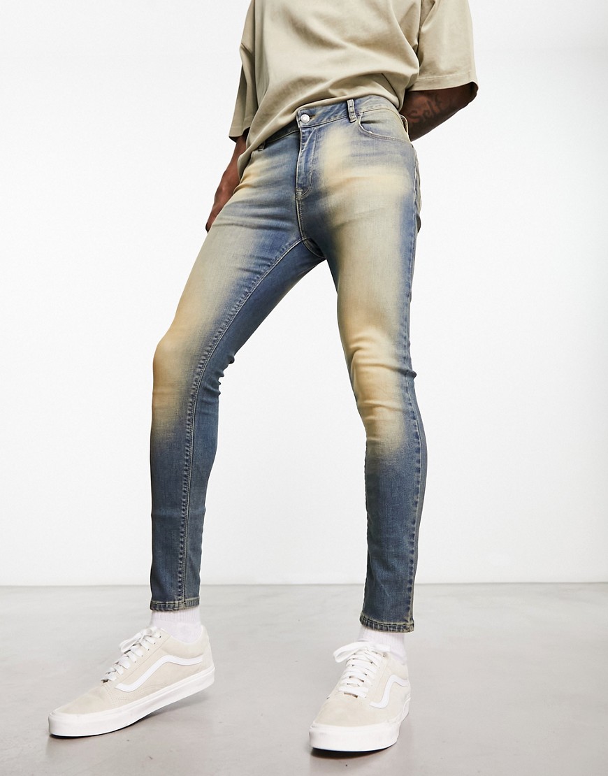 spray on jeans with power stretch in tinted blue wash