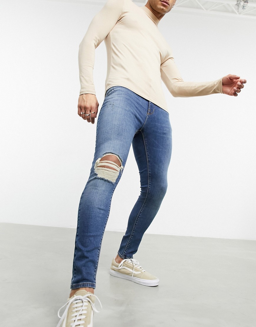 ASOS DESIGN spray on jeans with power stretch in vintage dark wash with rips-Blues