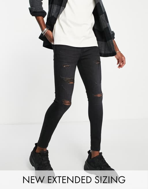 ASOS DESIGN spray on jeans with power stretch in washed black with heavy rips