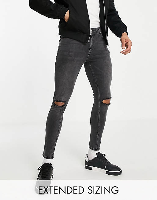 ASOS DESIGN spray on jeans with power stretch in washed black with knee ...