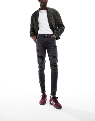 ASOS DESIGN spray on jeans with power stretch in washed black with rips - ASOS Price Checker