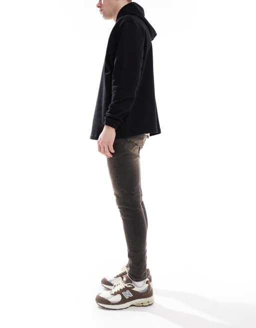ASOS DESIGN spray on jeans with power stretch in washed black with tint, 3 of 5