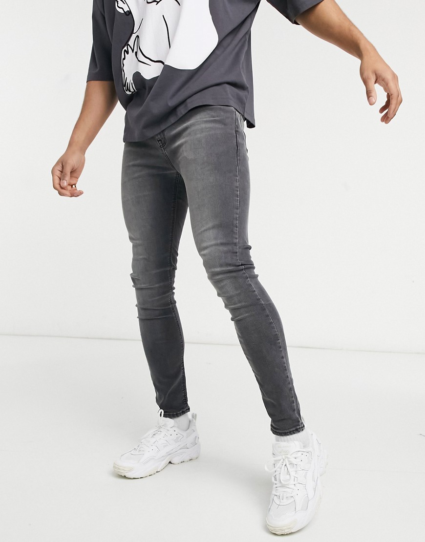 Product photo of Asos design spray on jeans with power stretch in washed black
