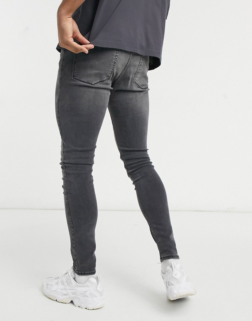Alternative product photo of Asos design spray on jeans with power stretch in washed black