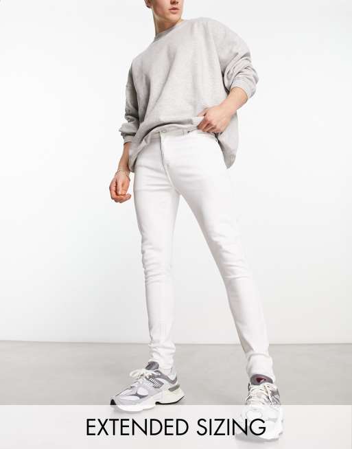 ASOS DESIGN spray on jeans with power stretch in white