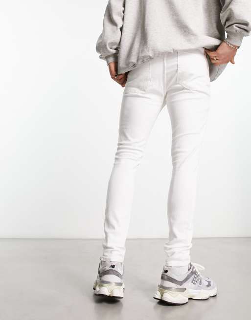 ASOS DESIGN spray on jeans with power stretch in white