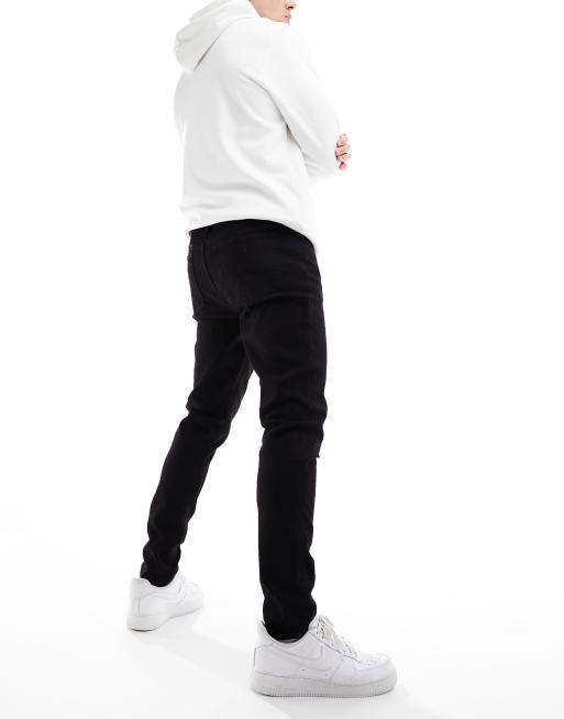 ASOS DESIGN spray on jeans with powerstretch in black, 2 of 5