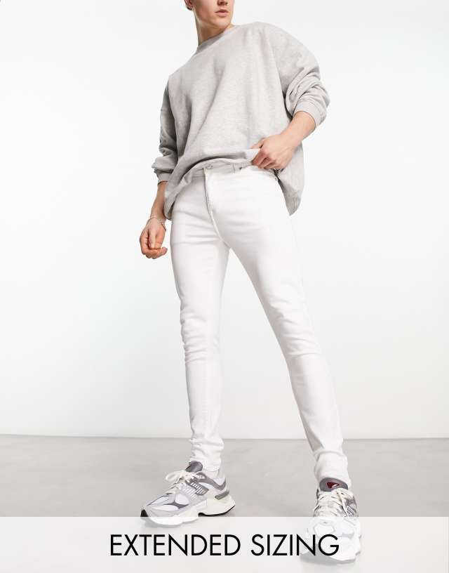 ASOS DESIGN spray on jeans with powerstretch in white